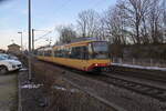 Triebwagen 874 verlsst als S4 nach Leingarten gerade Bretzfeld am 21.1.2024