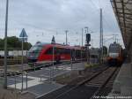 642 553/053 als RE8 mit ziel Tessin und ODEG ET 445.115 als RE2 mit ziel Cottbus im Bahnhof Wismar am 13.7.14