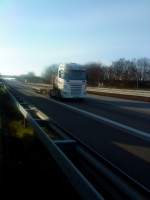 LKW Scania Hngerzug mit Plattformaufbau der Spedition Detmers Transporte gesehen auf der A61 Hhe Raststtte Dannstadt am15.01.2014 