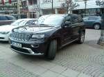 Youngtimer/308951/suv-jeep-grand-cherokee-in-der SUV Jeep Grand Cherokee in der Bad Drkheimer Innenstadt am 05.12.2013