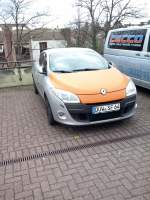PKW Renault Megane GT Coupe gesehen auf einem Parkplatz in Bad Drkheim am 07.02.2014