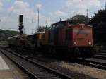 Br 203 von der Bocholter Eisenbahngesellschaft zieht einen Bauzug von der Firma Schwertbau durch K�ln West am 26.6.10