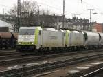 Captrain 186 148 und 186 *** mit einem Getreidezug in K�ln West am 12.2.2011