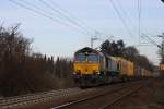 Die Class 66 kommt mit einem gemischten Containerzug von Aachen-West nach Montzen/Belgien am Gemmenicher-Weg hoch.
20.3.2011