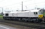 An grauen 12 Mai 2012 schleppt ECR 247 035 ein Leerstahlzug durch Oberhausen Osterfeld Süd.