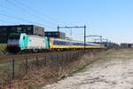 br-186-traxx-140ms/770955/ns-186-223-schiebt-ein-ic-zug NS 186 223 schiebt ein IC-Zug nach Eindhoven durch Tilburg-Reeshof am 8 März 2022.