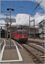 Die SBB Re 4/4 II 11264 (Re 420 420264-4) und eine weitere mit dme Spaghetti-Zug in Lausanne.