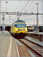 Die SBB Re 460 114-3  Western Union  Werbelok in Zürich HB. 

Analogbild vom Feb. 1998