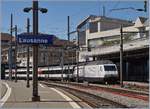 Die SBB Re 460  100 Jahre SEV  verlässt mit einem IR 15 nach Luzern den Bahnhof von Lausanne.