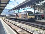 Die SBB Re 460 019-3  175 Jahre Schweizer Bahnen  verlässt mit dem IR 90 1719 nach Brig den Bahnhof von Lausanne. Es ist nach den schweren Unwettern einer der ersten Züge, der wieder via Sion nach Brig fährt.

4. Juli 2024