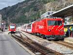 MGB/861719/der-glacier-express-von-zermatt-nach Der Glacier Express von Zermatt nach St. Moritz beim Halt in Brg.
12. Sept. 2024