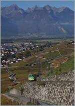 Mit dem TPC A-L Bt an der Spitze und dem schiebenden TPC A-L BDeh 4/4 310 erklimmt der R 70 336 die Steigung vom Tal hinauf in Richtung Leysin Grand-Hôtel.