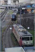 Ein Blick in den  Hinterhof  der MOB mit der abgestellten GDe 4/4 6006 (ex GMF/TPF) und einen GEX. 

29. April 2025